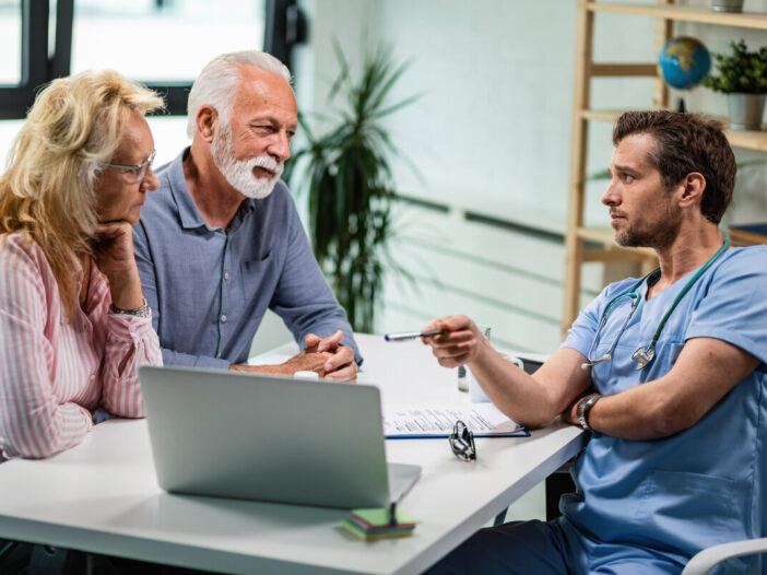 Male doctor pointing